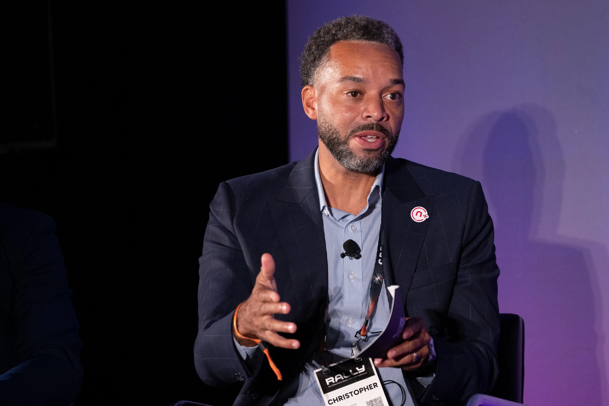 Chris Redd speaking on a panel at Rally Conference
